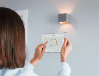 rear view of woman that is indoors controlling sma 2021 09 03 14 41 38 utc 1